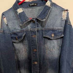 Women’s distressed denim jacket